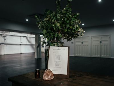 An empty, serene exercise studio with natural light.